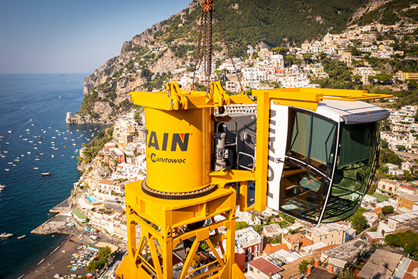 The Potain MDT 189 tower crane’s Ultra View Cab is lifted into place.